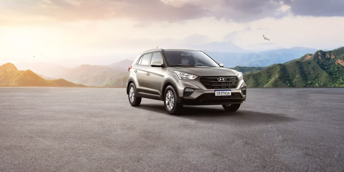 creta-action.avif Modelo CRETA Action de frente na cor cinza