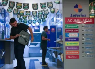 Mega-Sena 2977 acumula e prêmio vai a R$ 145 milhões Lotérica com pessoas fazendo jogos